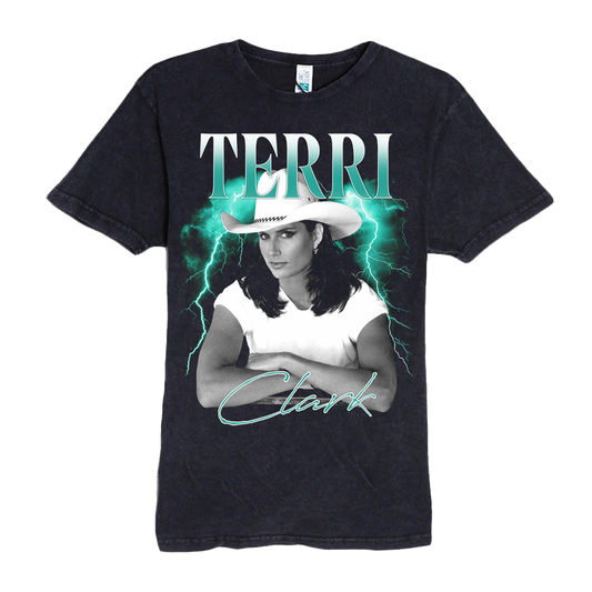 A black short-sleeve graphic t-shirt featuring a portrait of Terri Clark with lightning effects and the text 'TERRI Clark' printed on the front, displayed against a solid white background.